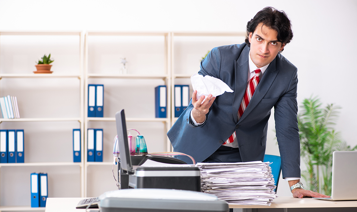 Guy angry with copier